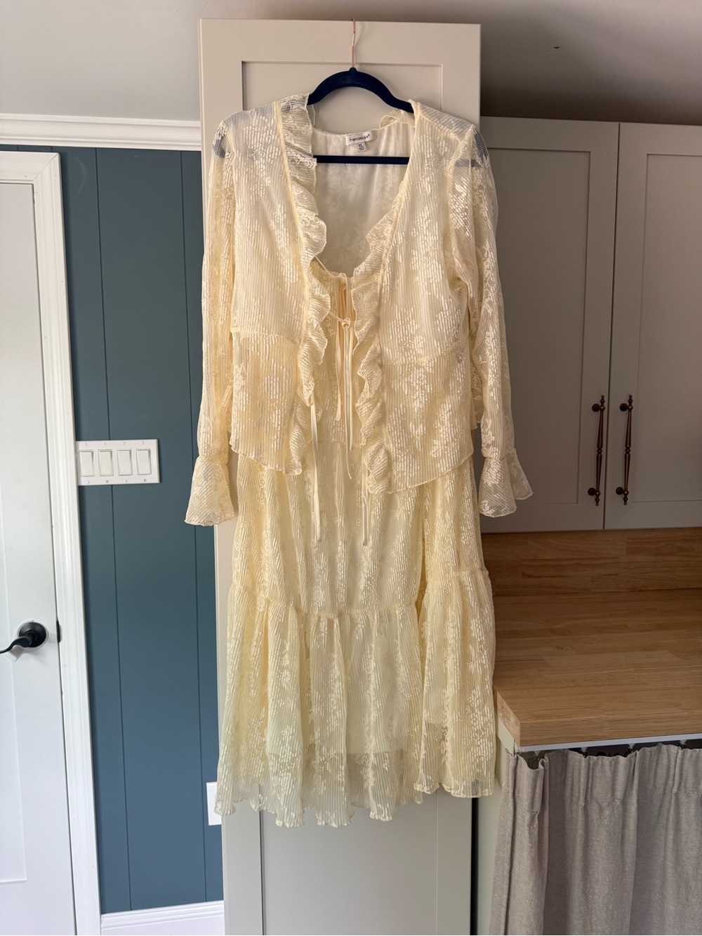 Francesca’s matching ivory lace maxi skirt set